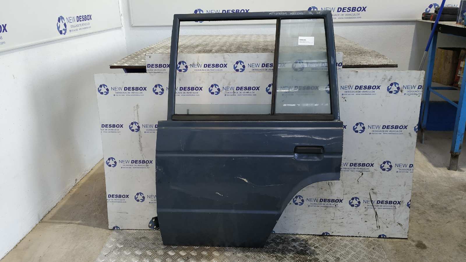 PUERTA TRASERA IZQUIERDA MITSUBISHI MONTERO (L040)