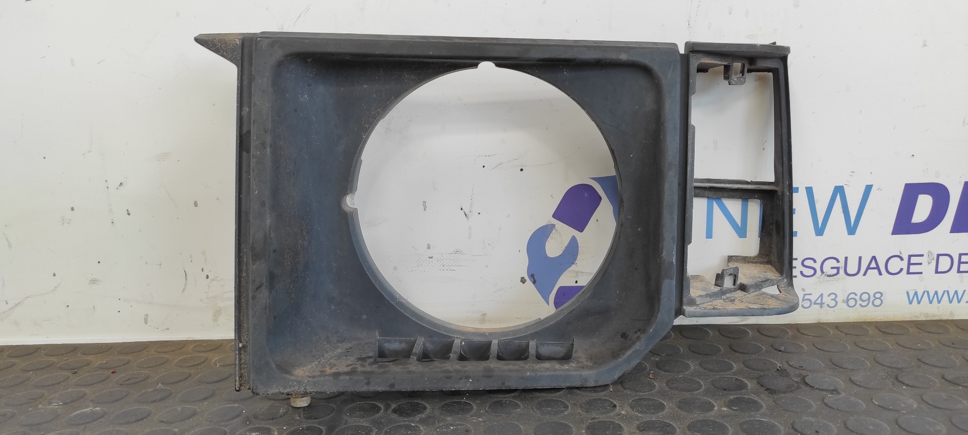 SOPORTE FARO IZQUIERDO MITSUBISHI MONTERO (L040)