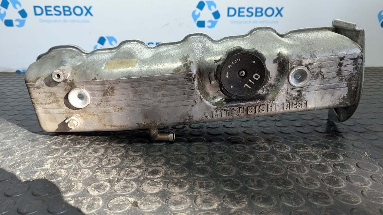 TAPA BALANCINES MITSUBISHI L 200 (K6/7)