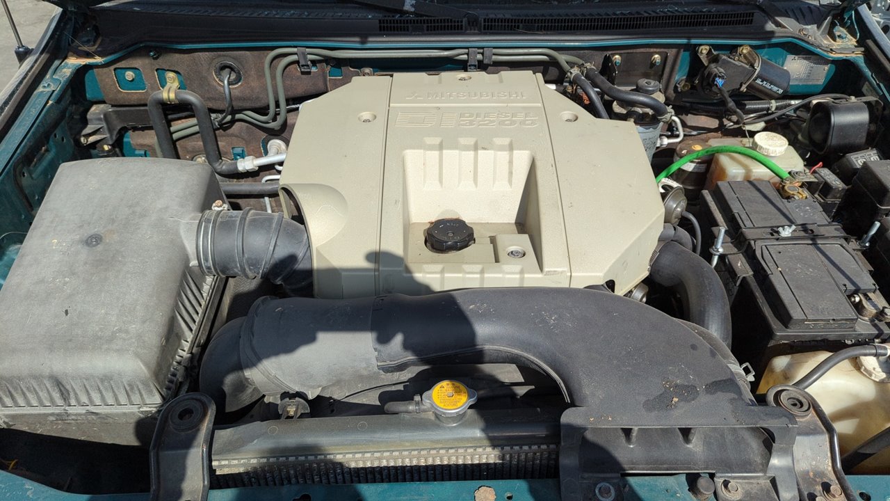 FARO DERECHO MITSUBISHI MONTERO (V80/V90) - vista 11