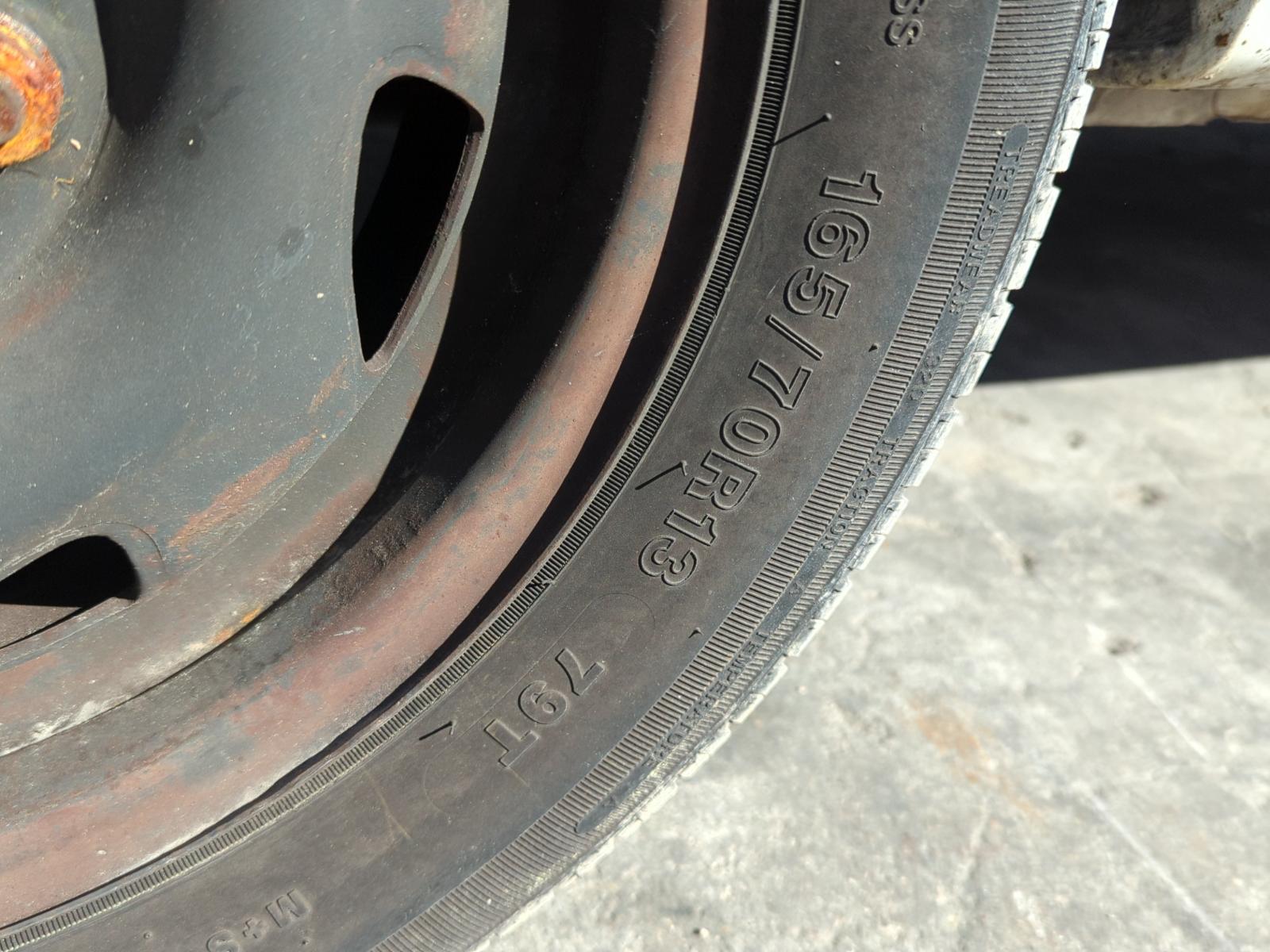 NEUMATICO REPUESTO FORD FIESTA COURIER - vista 12